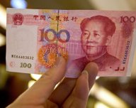 Čínský jüan - ilustrační foto